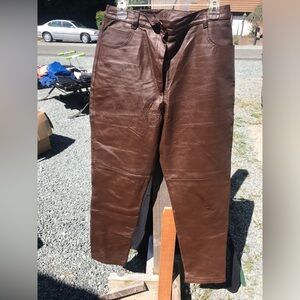 Like new but have been worn. Was stored in a home that person smoked